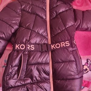I am selling a black and pink Michael Kors coat